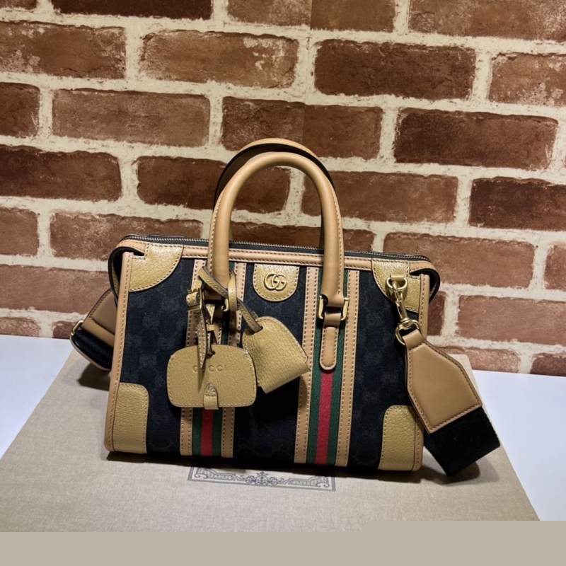 G*u*i top handle bags